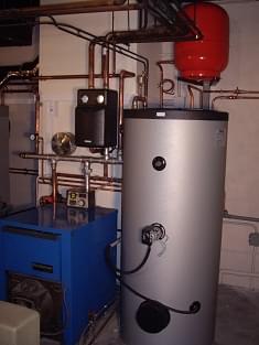 Chaudière bois Fröling S4 turbo avec relève chaudière fioul