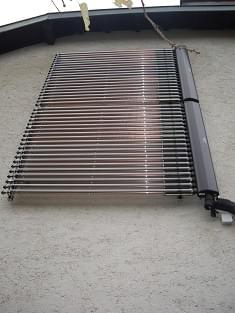 Tubes solaire en façade et relève chaudière fioul